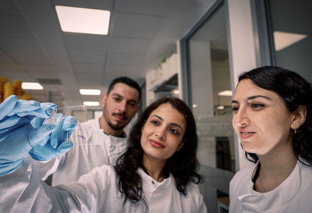 Image of scientists within industrial environment